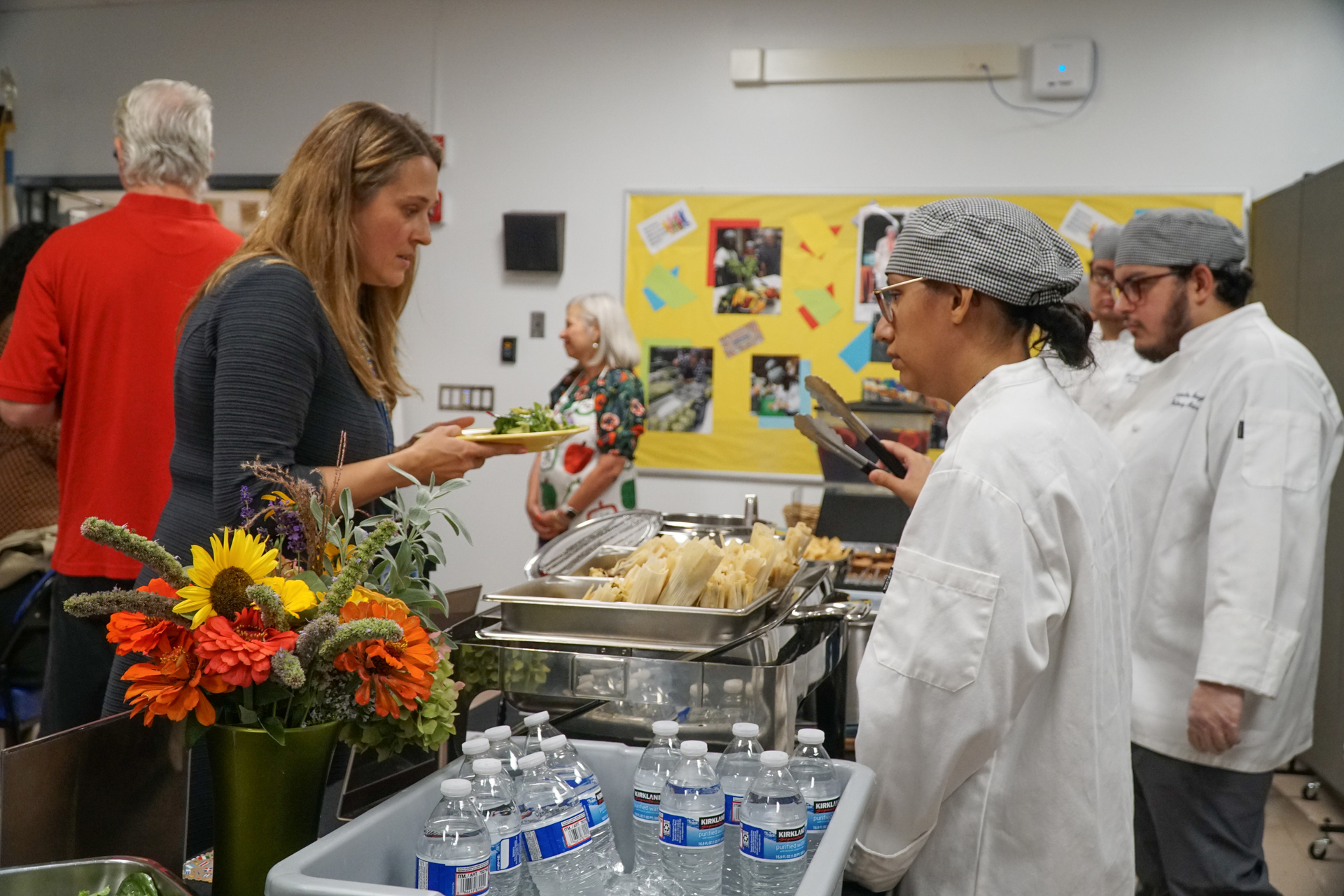 image of students working on food line