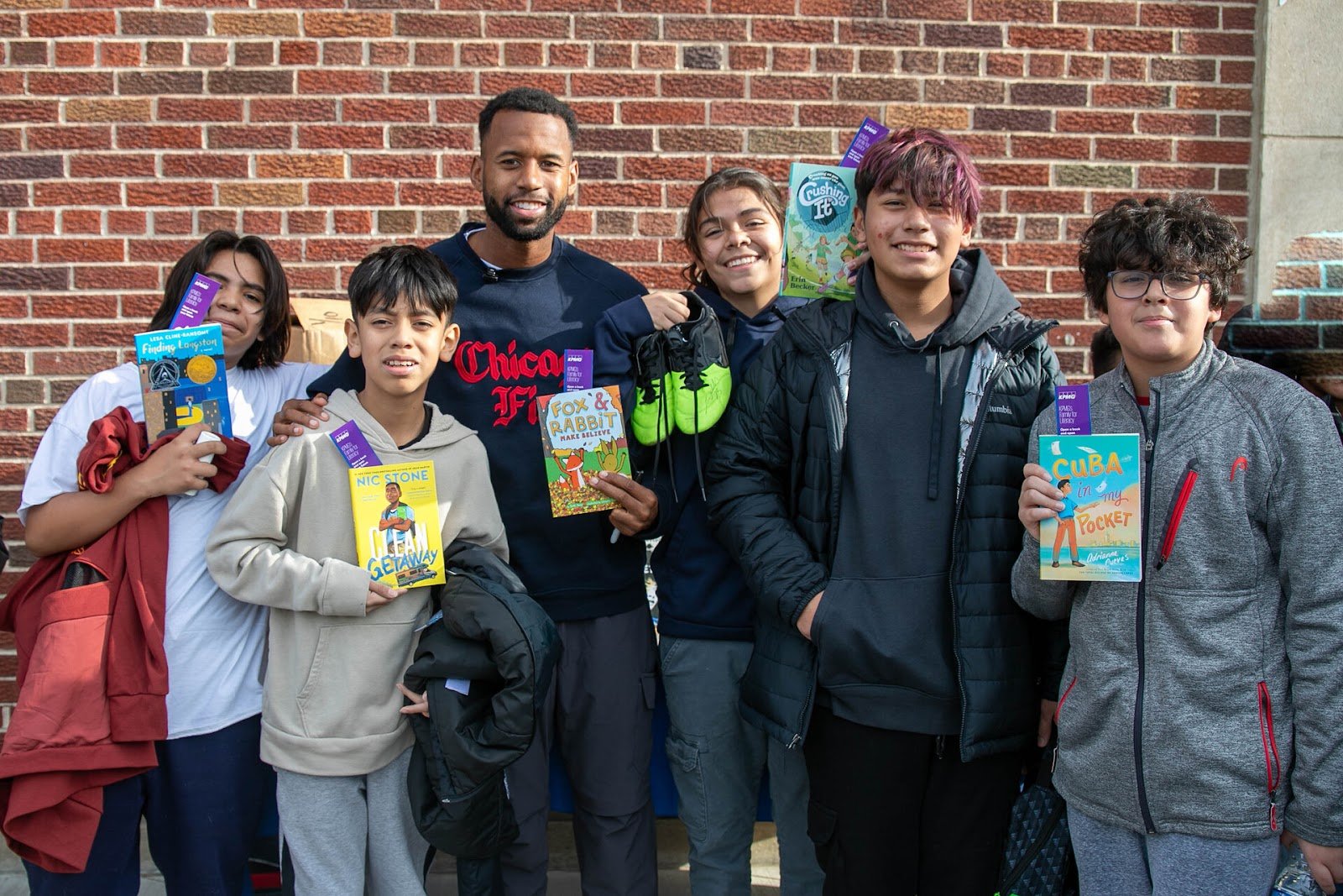 Group of students at South Shore Fine Arts Academy with Kellyn Acosta