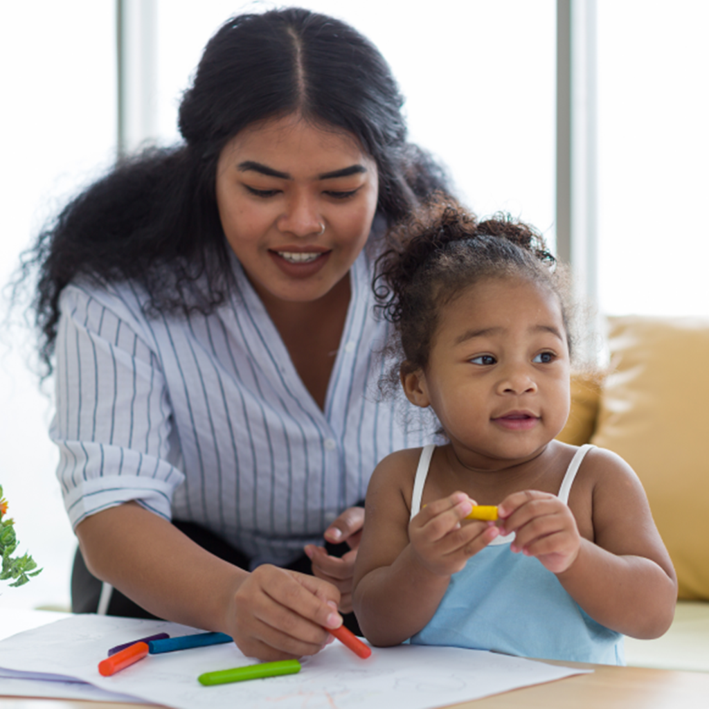 Mother and child drawing together