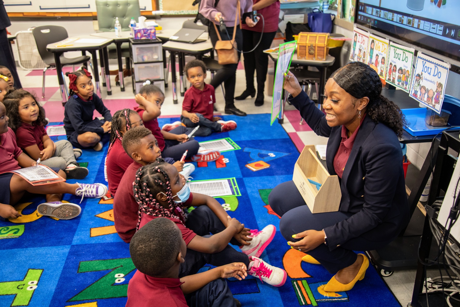 young students on Classroom carpet