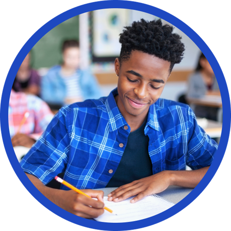 Student taking notes in a notebook