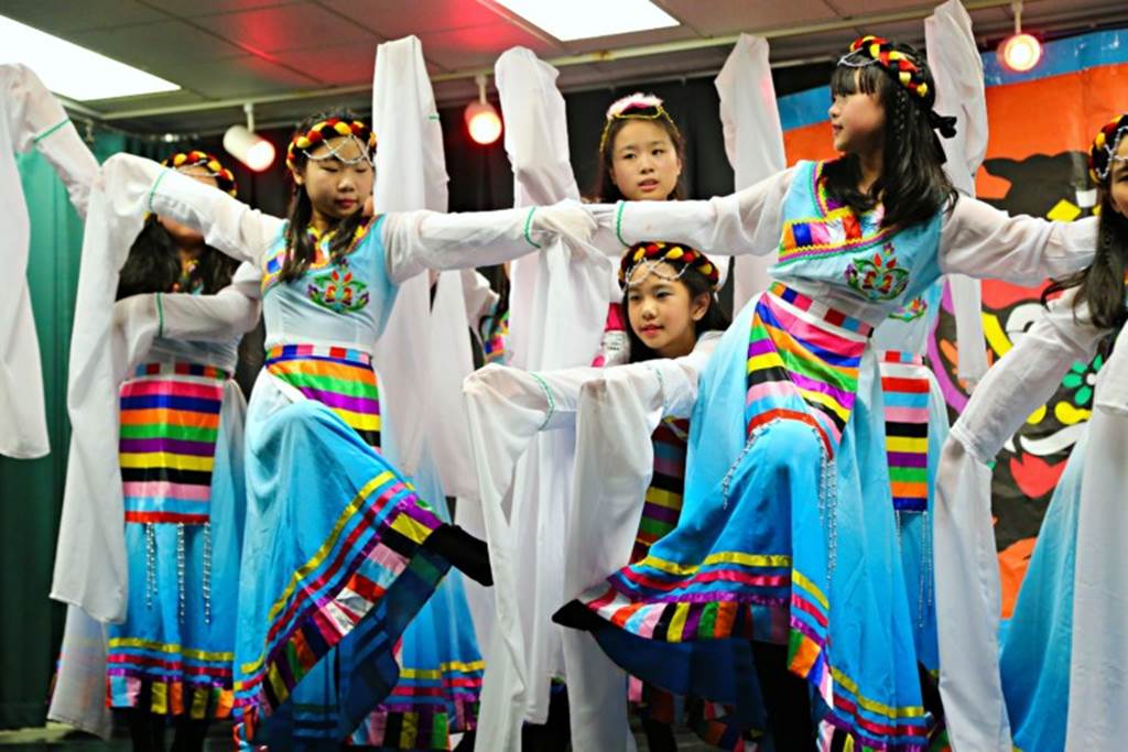 Six students dance in sequence