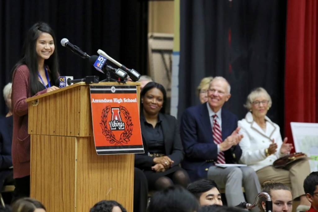 Student stands at a podium