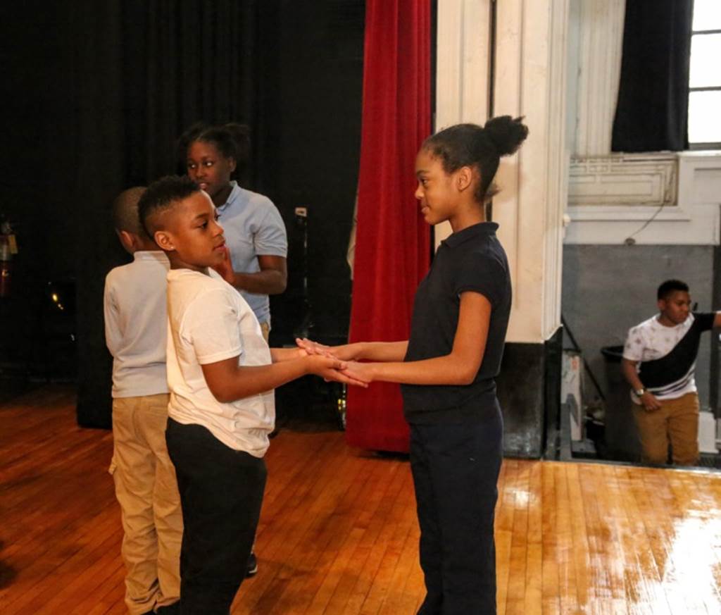 Two students dancing