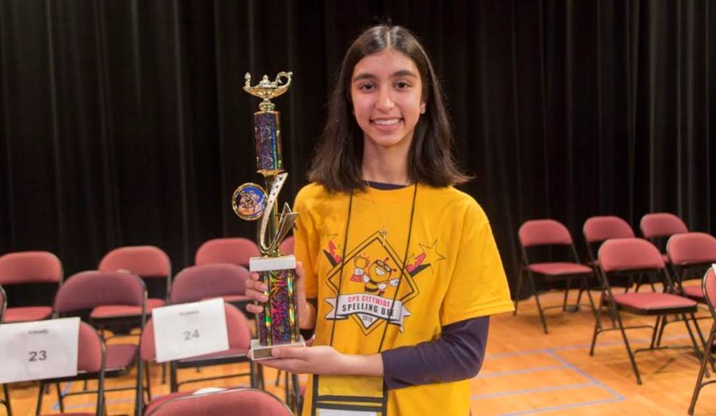 Riya Joshi holds a trophy