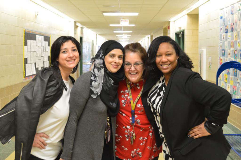 Four teachers posing