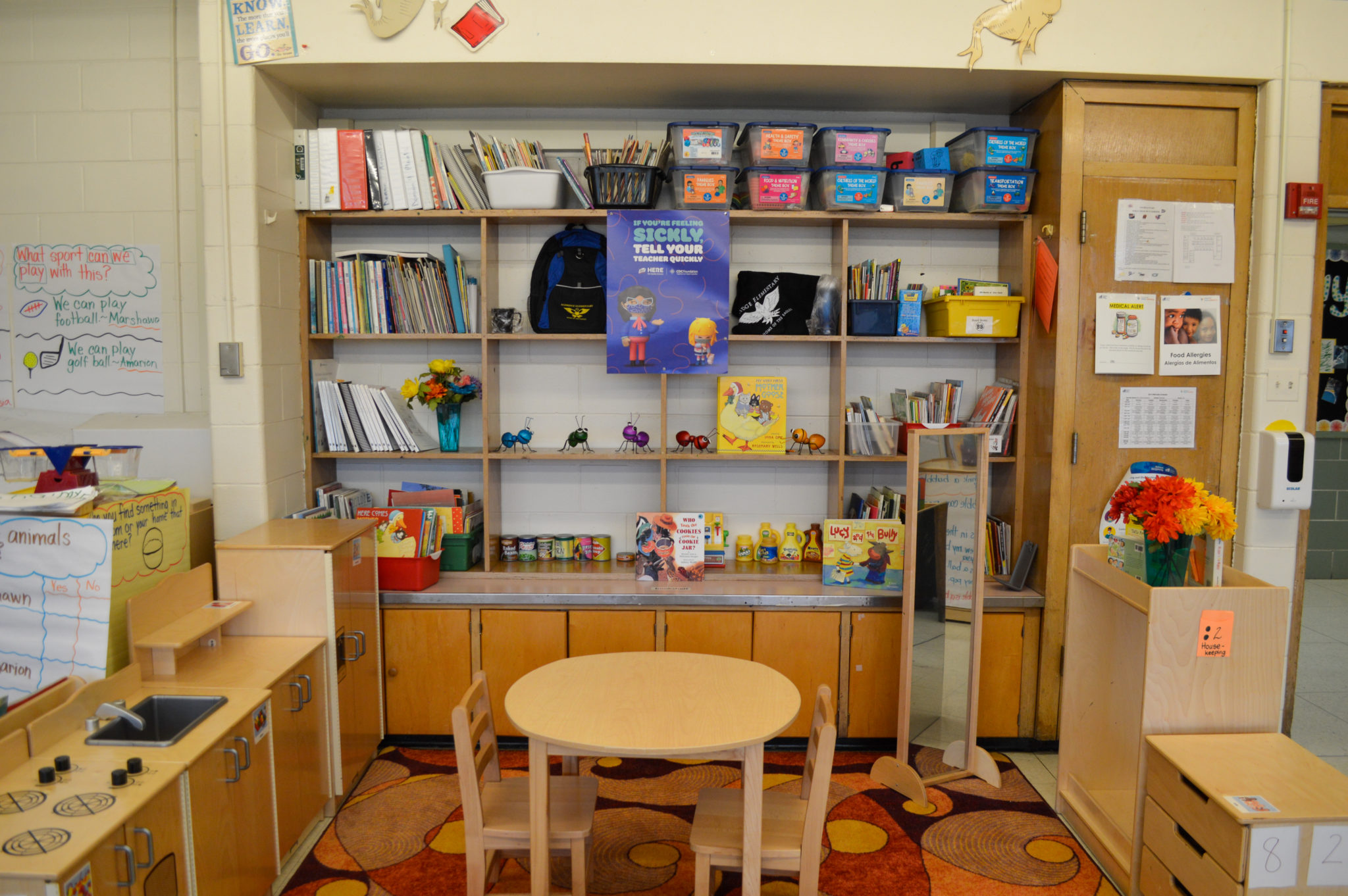 A mini kitchen set inside a classroom