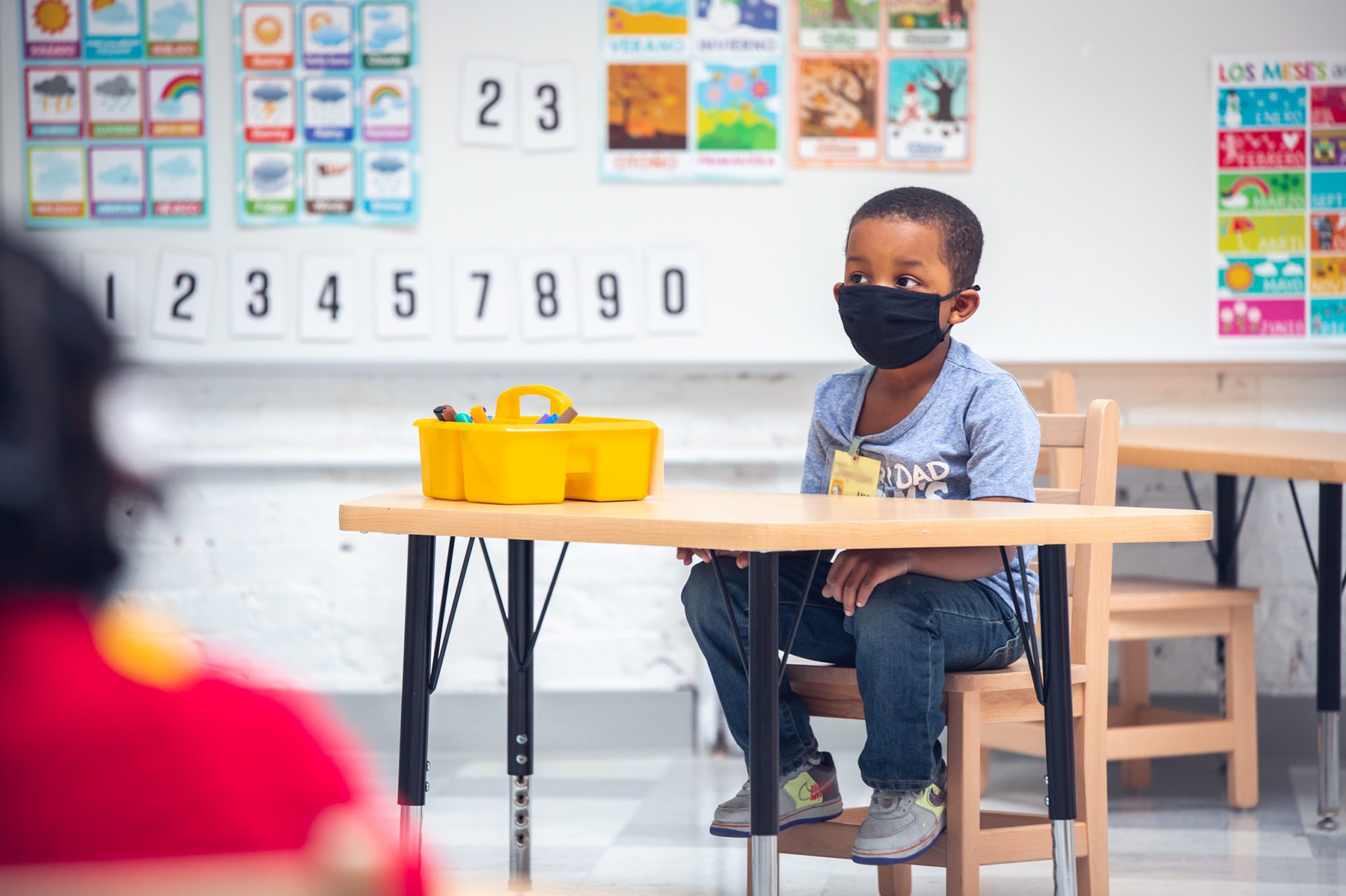 A boy sitting at a desk