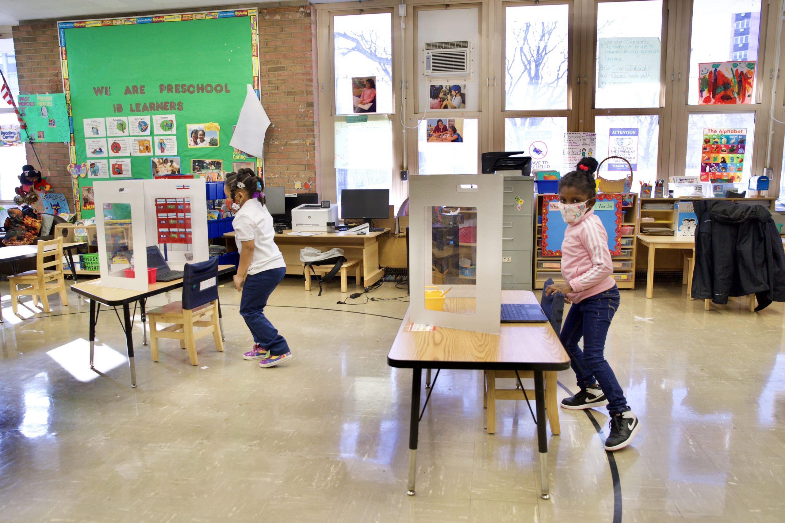 Students standing at their desks