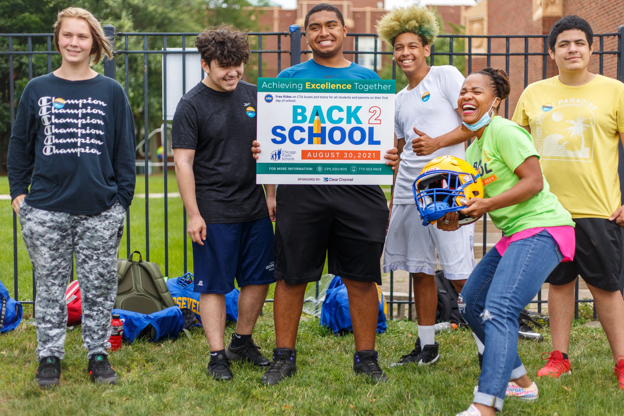 Students holding a Back 2 School sign