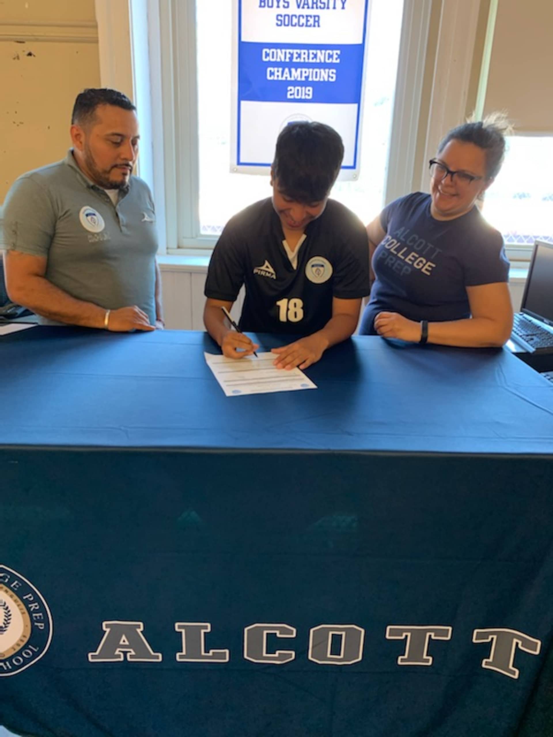 Max signing scholarship photos