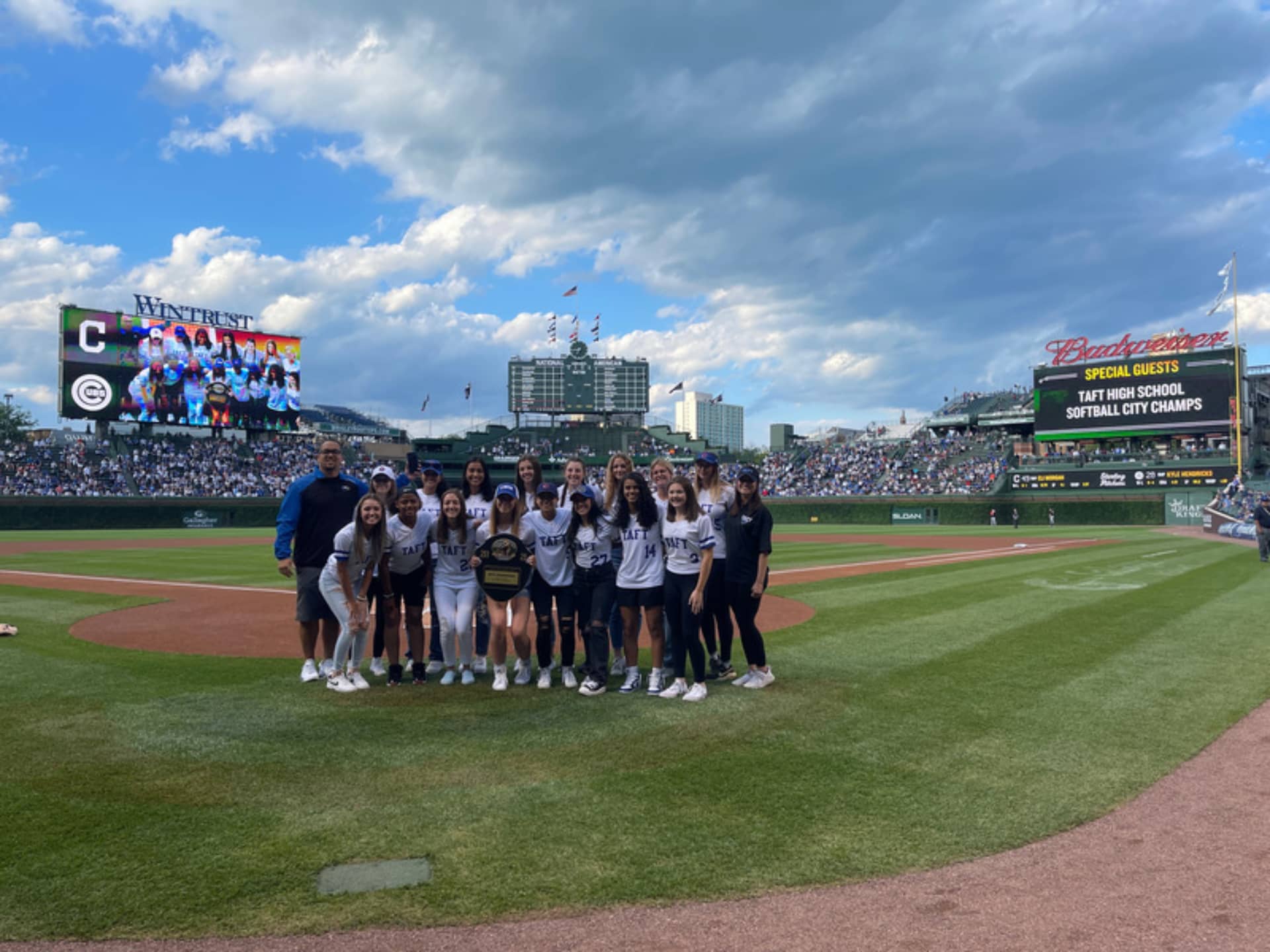 The team taking a photo on the field