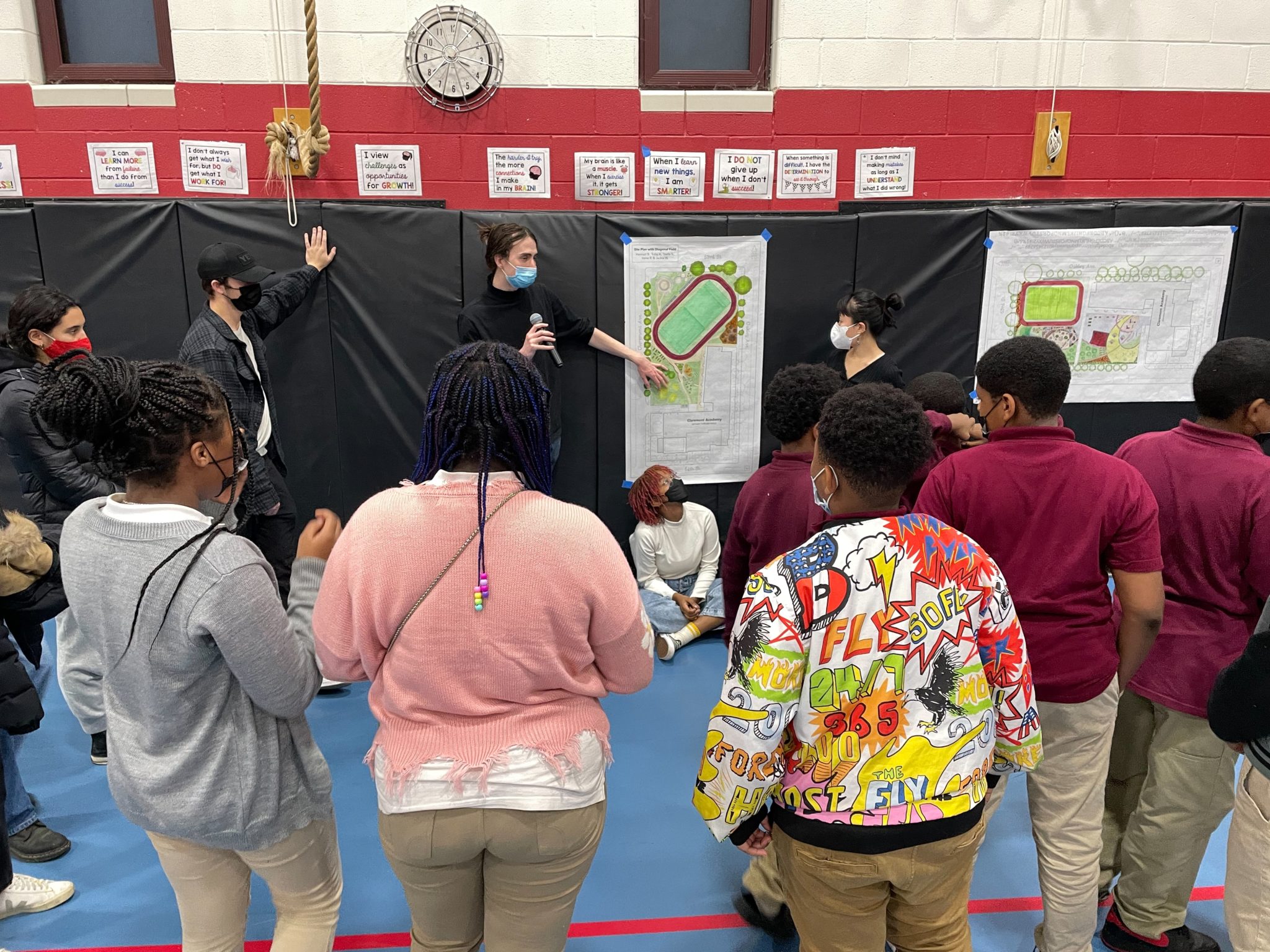 Group of students reviewing plans